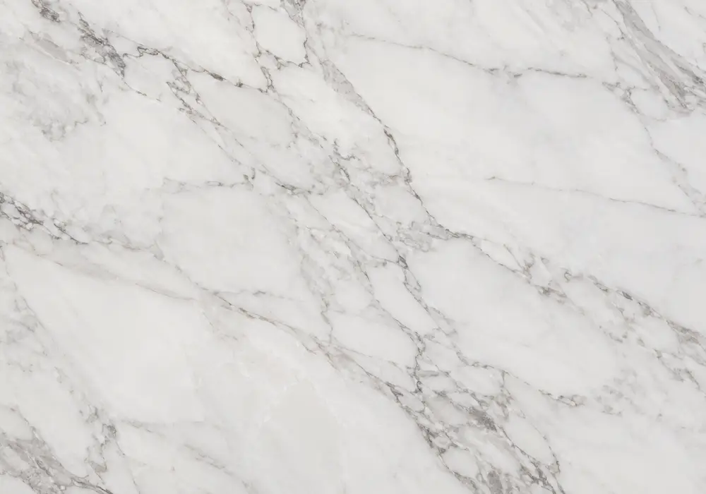 Statuario White UAE showcased in an ultra-luxury master bathroom, showing natural veining and refined architectural detail.