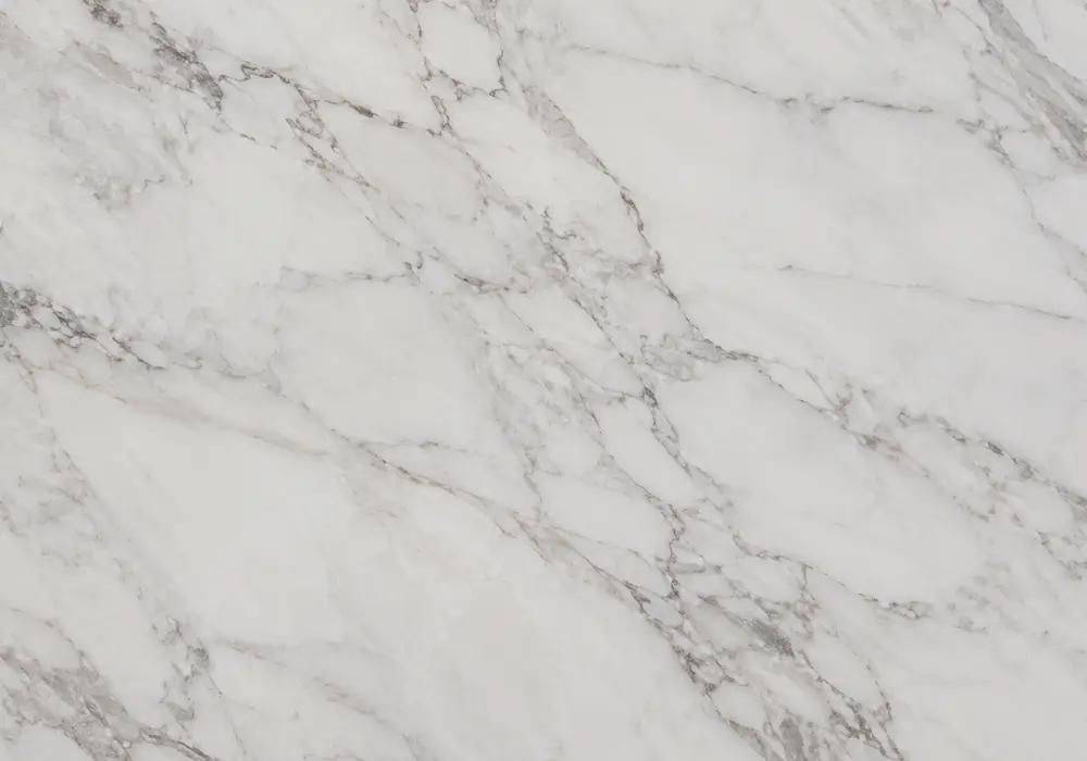 Stone detail for Teak Wood marble price, combining brown and beige, flowing waves and soft swirls, across a luminous surface.