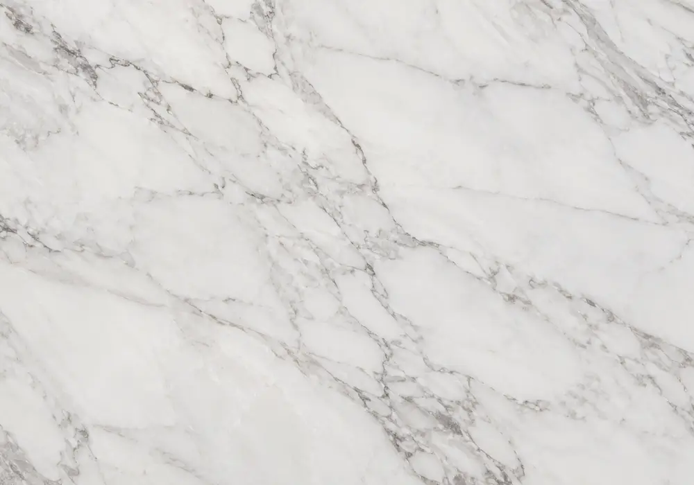 Teakwood marble price shown on a polished brown and beige slab with flowing waves and soft swirls, across a luminous surface.