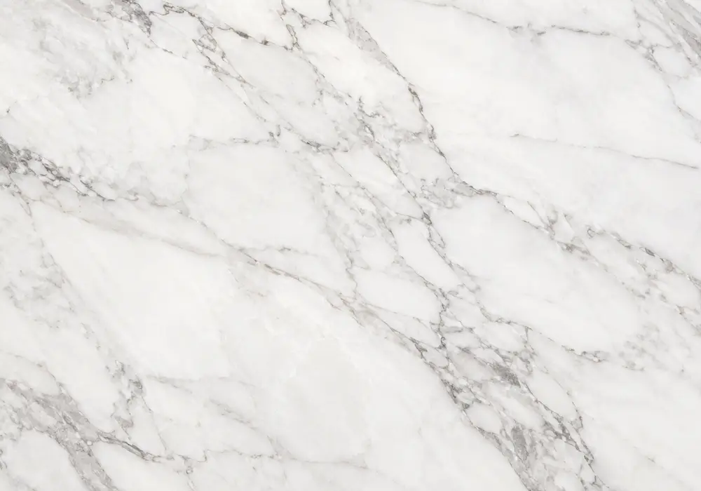Thassos White marble showcased in a Greek hammam and spa, showing authentic stone texture and refined architectural detail.