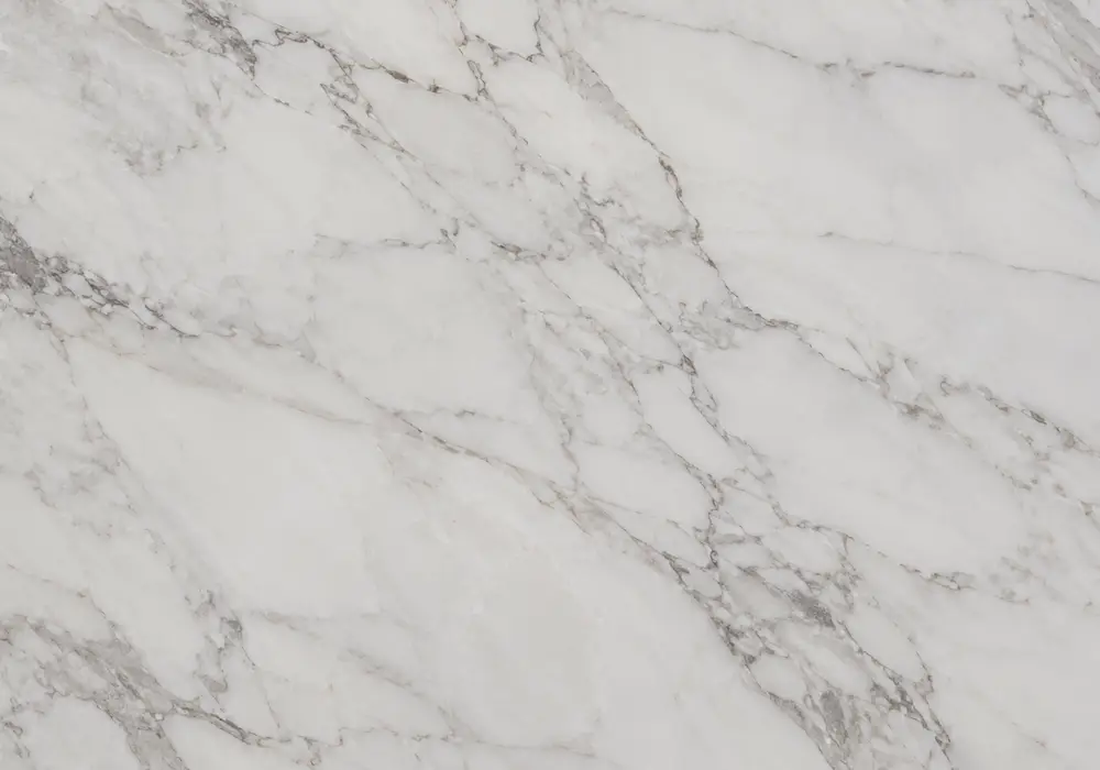 Thasos marble luminous fireplace surround with brilliant crystalline white stone and minimal visible veining