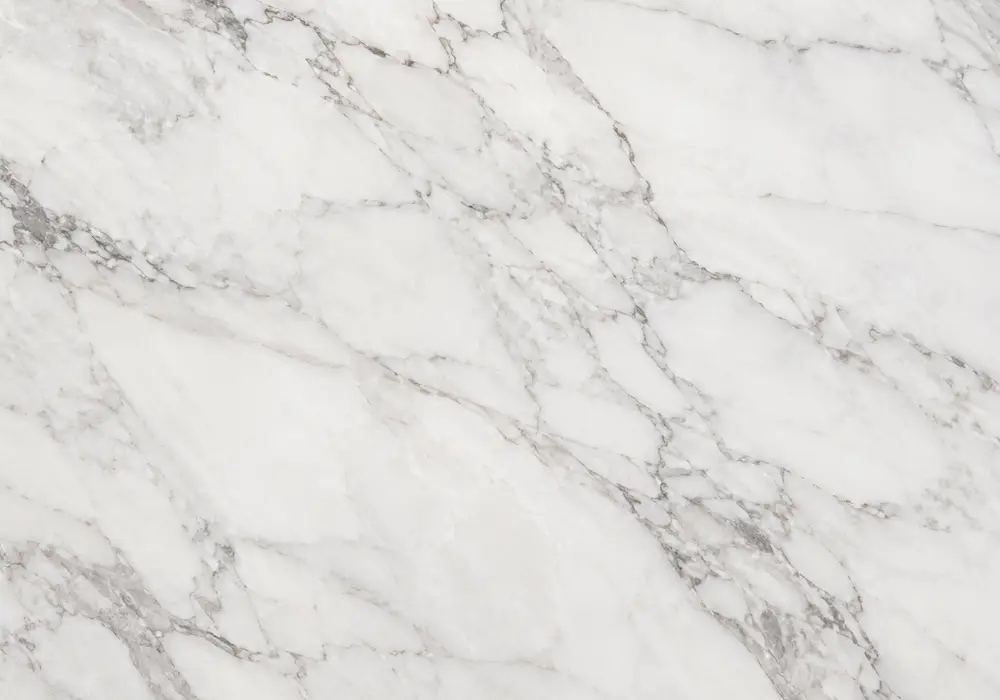 high-commercial white grade shown on brilliant crystalline slabs, honed facade cladding and a polished technical sample.