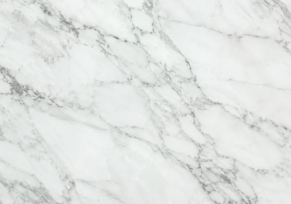 Tinos Oasis marble in a Greek luxury lounge, with authentic veining, polished stone depth and refined architectural detail.