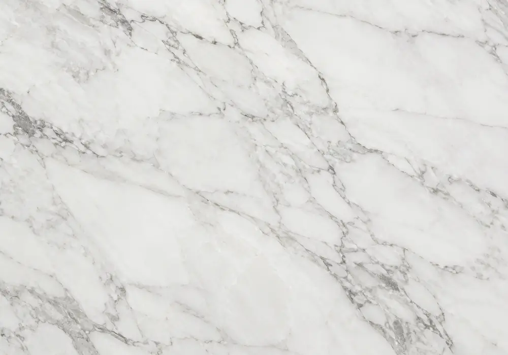 Stone detail for Eramosa marble, combining brown and beige, clouded movement and natural veining, with smooth luminous depth.