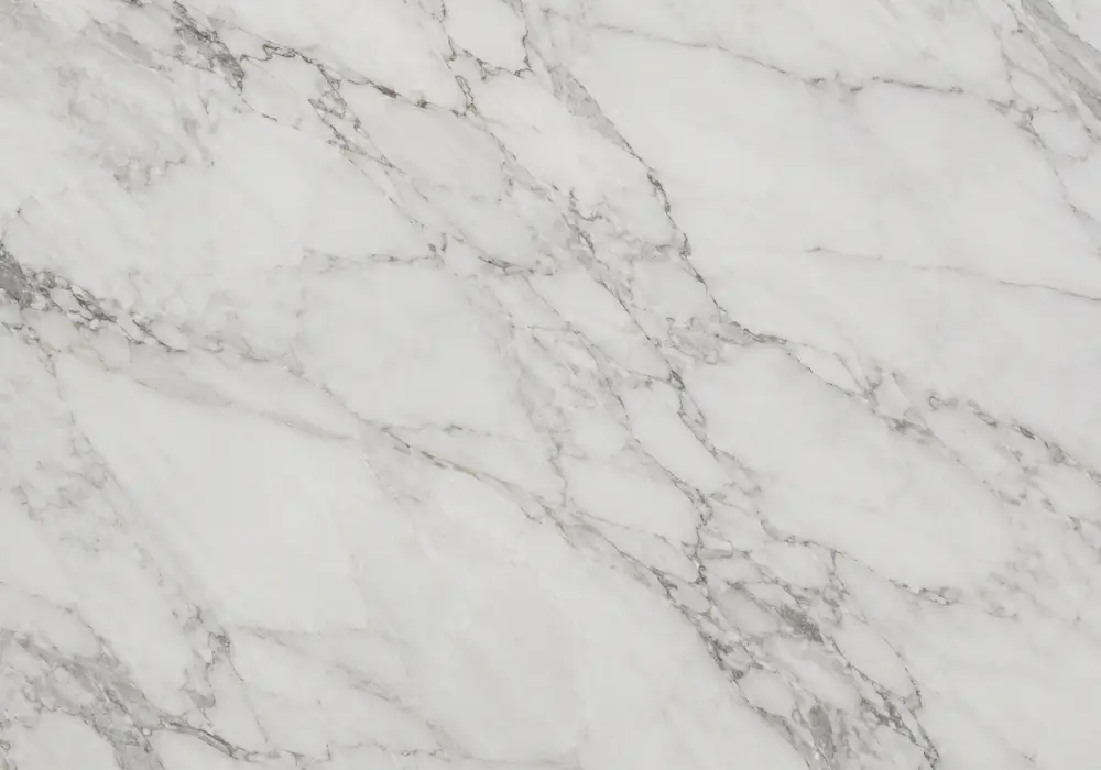 Tundra Beige Marble luxury fireplace surround with warm greige stone and subtle cream and brown veins.