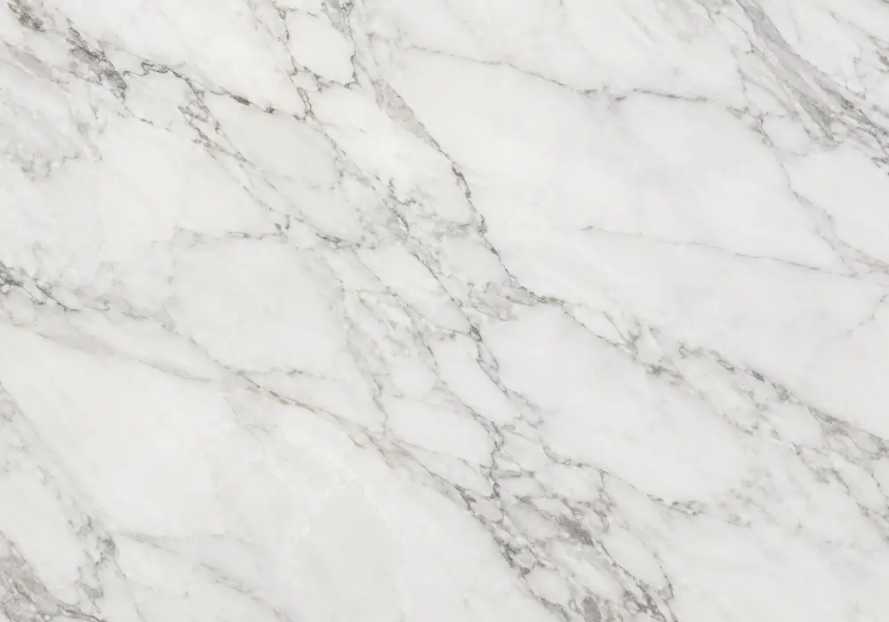 Understated tundra beige marble price slab with warm greige depth, cream veins, sandy patches and gentle grey-brown streaks.