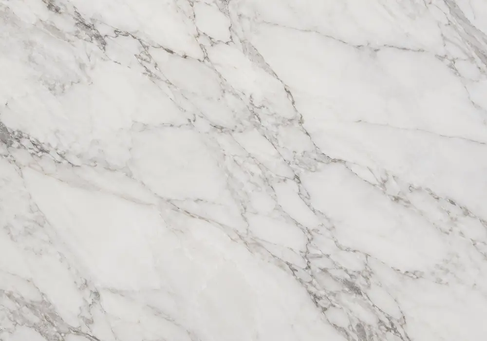 Tundra Gray marble contemporary foyer wall with calm grey stone, soft white veins and subtle cloudy movement.