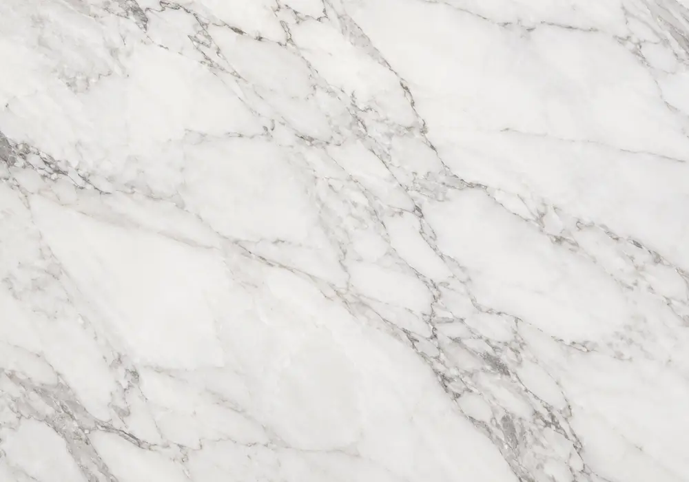 Warm cream, beige and grey mineral movement forms a refined natural example of the diverse Turkish marble category stone.