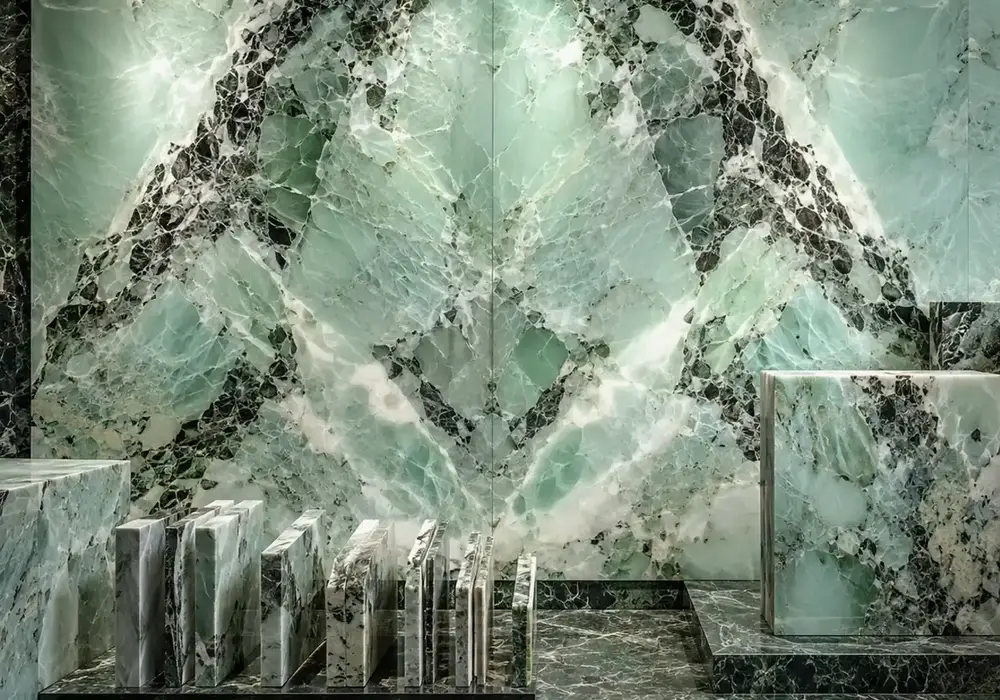 Jewel-toned Verde Alpi marble slab with emerald breccia, white networks, pale-green shifts and rich deep black-green zones.
