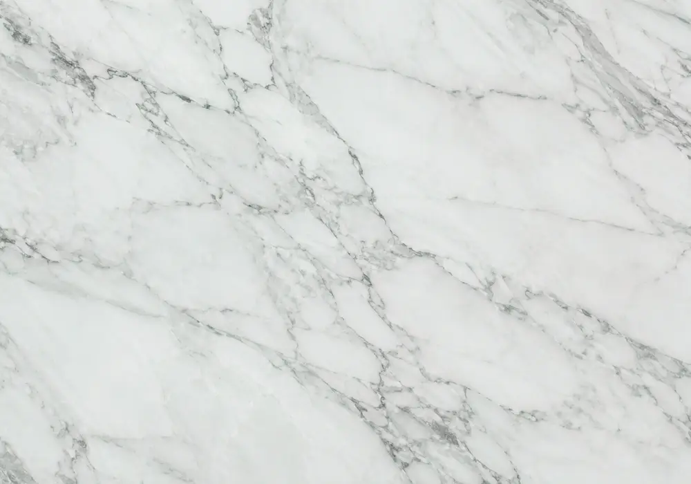 Dramatic Verde Guatemala marble slab with emerald and forest-green tones, fractured white rivers and dark organic veining.