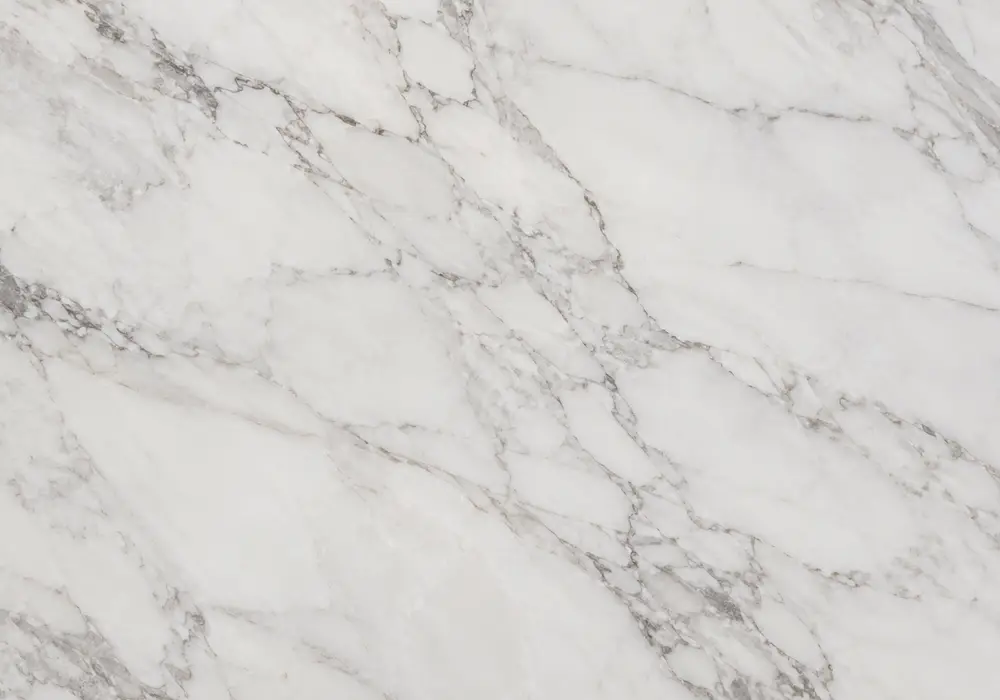 Discover verde levanto marble with deep petroleum-green colour, pale fractures, serpentine bands and black mineral depth.