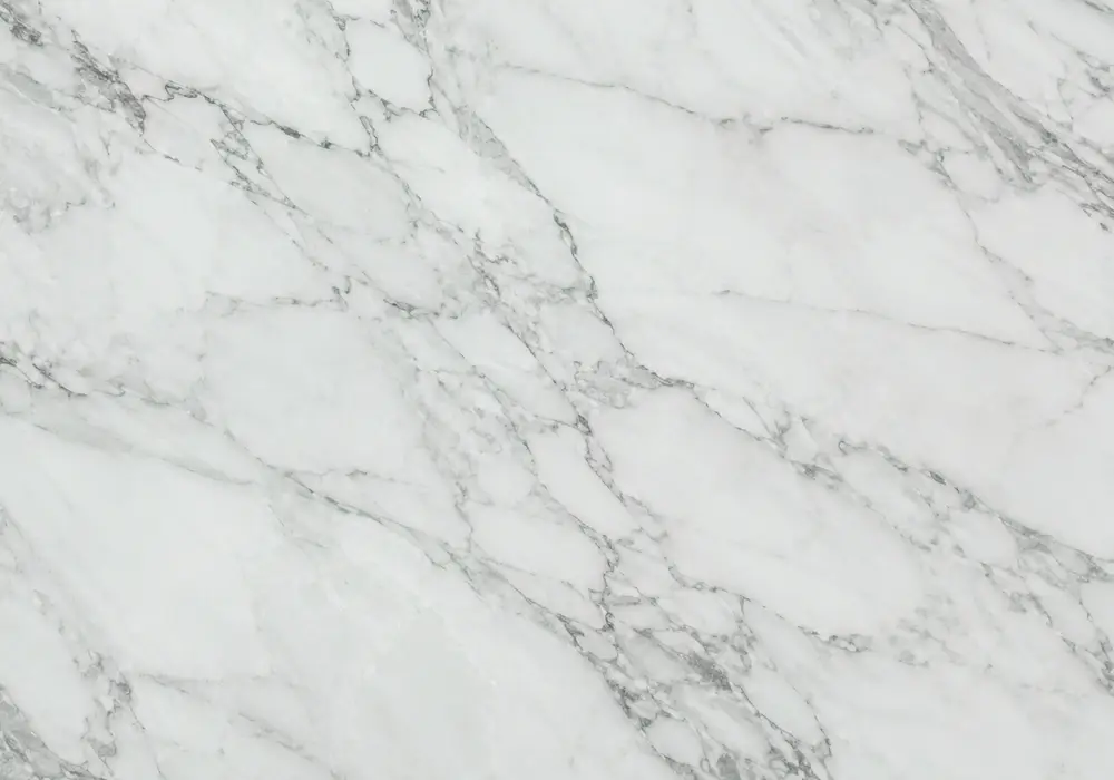 Naoussa Green marble in a luxury cocktail bar, with natural veining, polished stone depth and refined architectural detail.