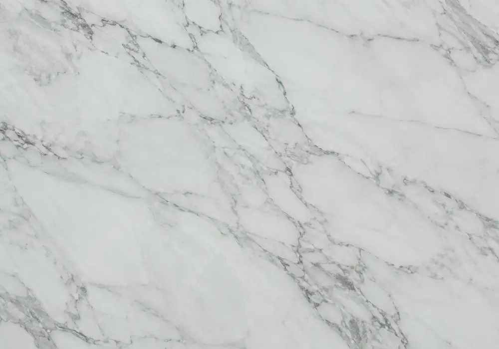 Veria Green marble statement reception panel with deep green stone and expressive pale mineral movement