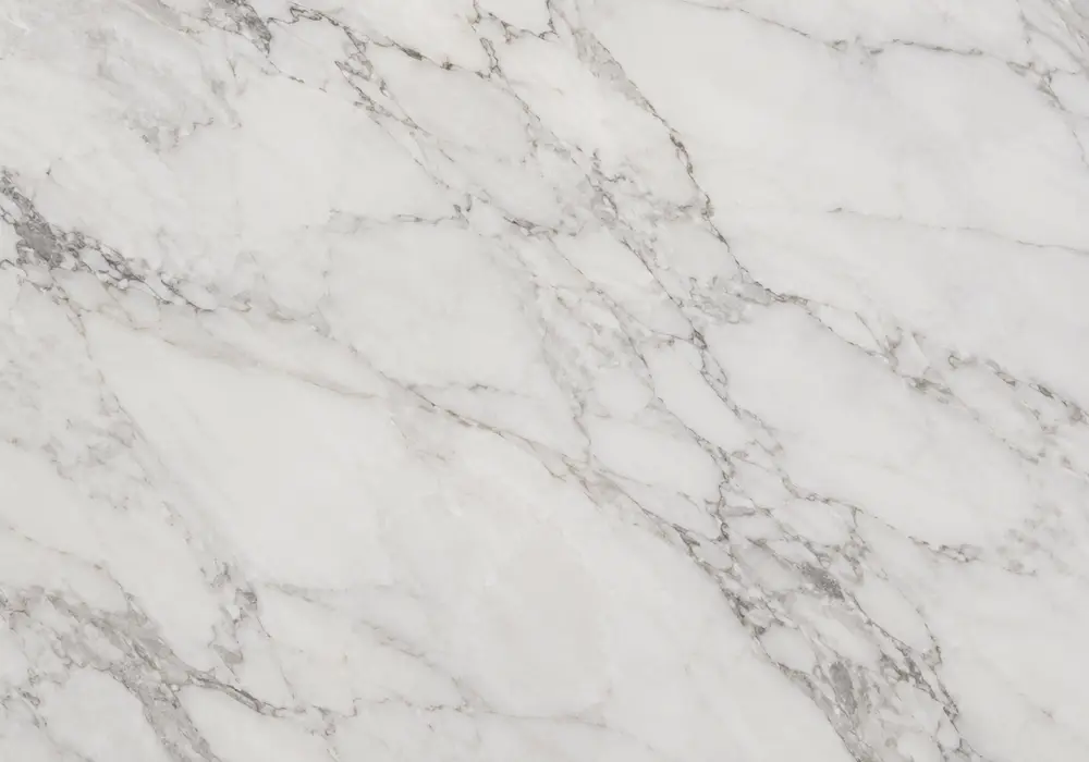 Versilia marble console table displaying Italian-inspired natural stone variation in a refined luxury gallery.