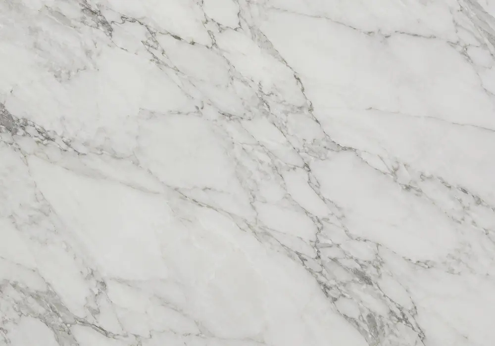 volakas gold kitchen in a luxury kitchen, showing natural veining, polished stone depth and refined architectural detail.