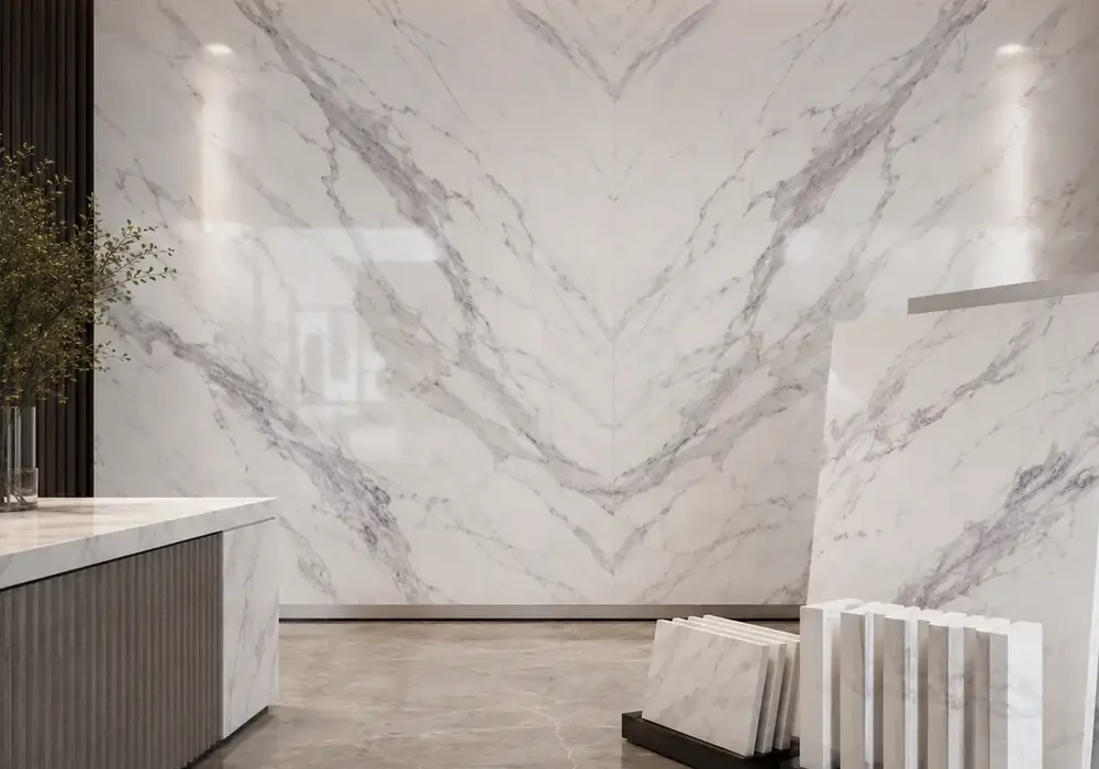 Volakas Extra slabs arranged with 20 and 30 mm edges, tile samples and crate-ready UAE stock in polished and honed finishes.