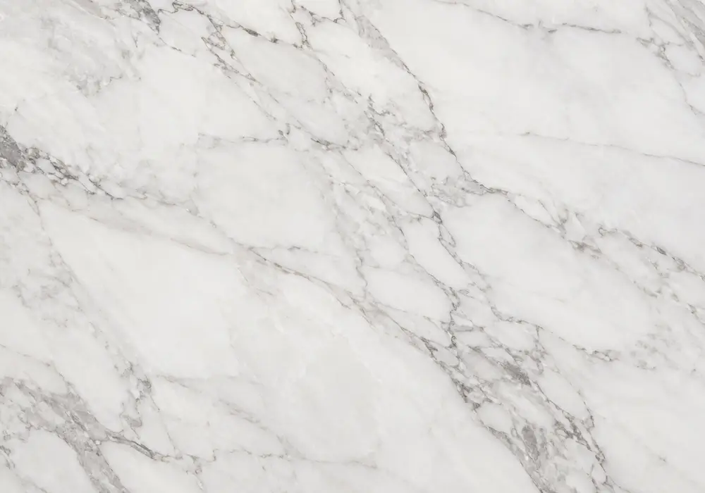 Falakro quarry marble across a luxury foyer and staircase, with realistic stone depth and refined architectural detailing.