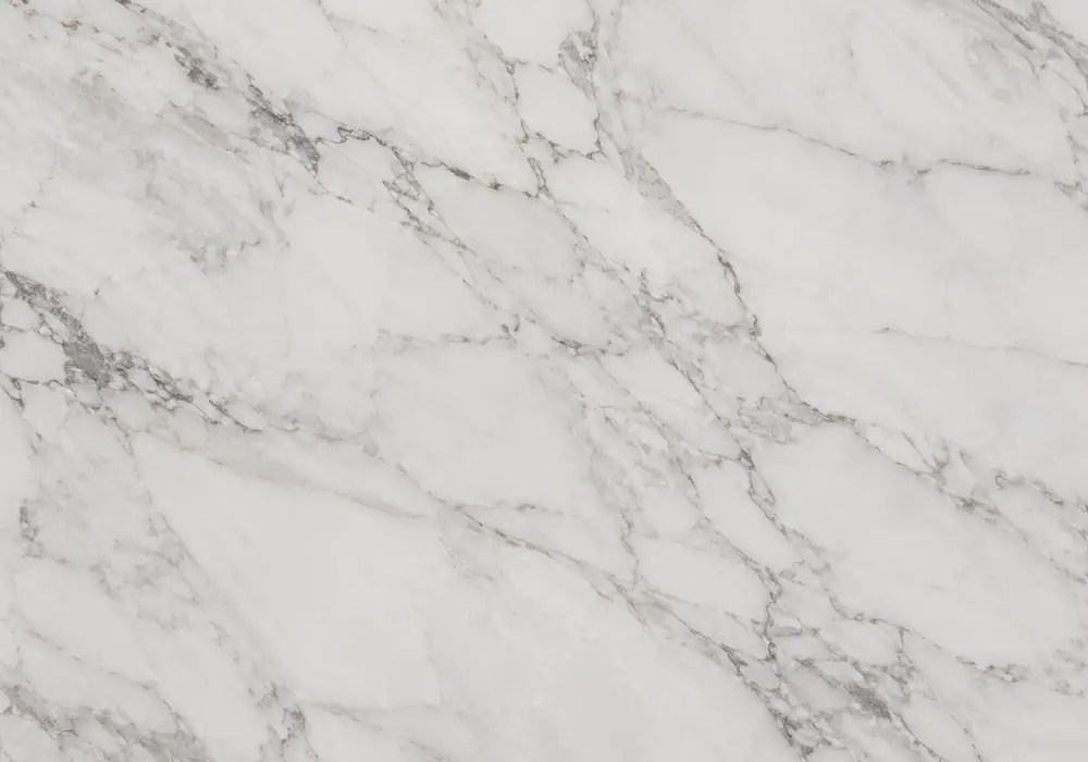 white gold fireplace in polished ivory stone with grey-gold veins, paired with vanity wall and honed bathroom flooring scene.