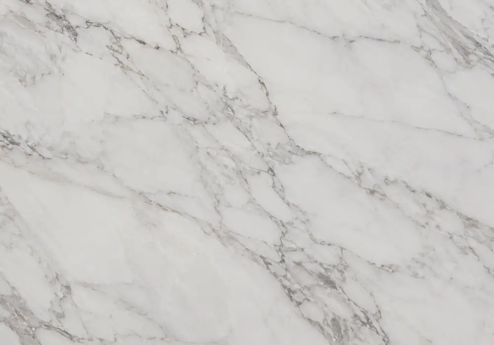 Calacatta marble in a luxury kitchen, showing authentic veining, realistic stone depth and refined architectural detail.