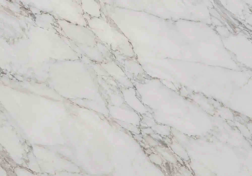 white red marble tile in a luxury foyer, showing natural veining, polished stone depth and refined architectural detail.