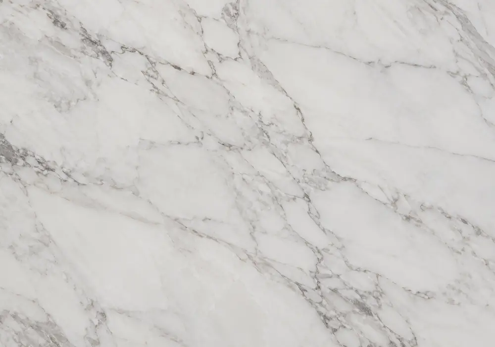 White and Red marble reception feature wall with luminous pale stone and dramatic red-burgundy veining.