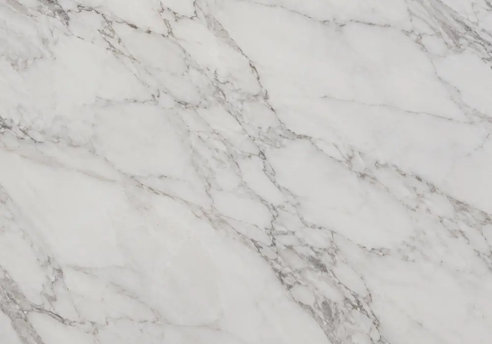 Striking White Beauty marble price slab with luminous white-grey areas, bold jade rivers, emerald islands and dark accents.