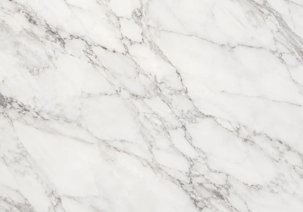white pearl marble UAE in a luxury bathroom, showing natural veining, polished stone depth and refined architectural detail.