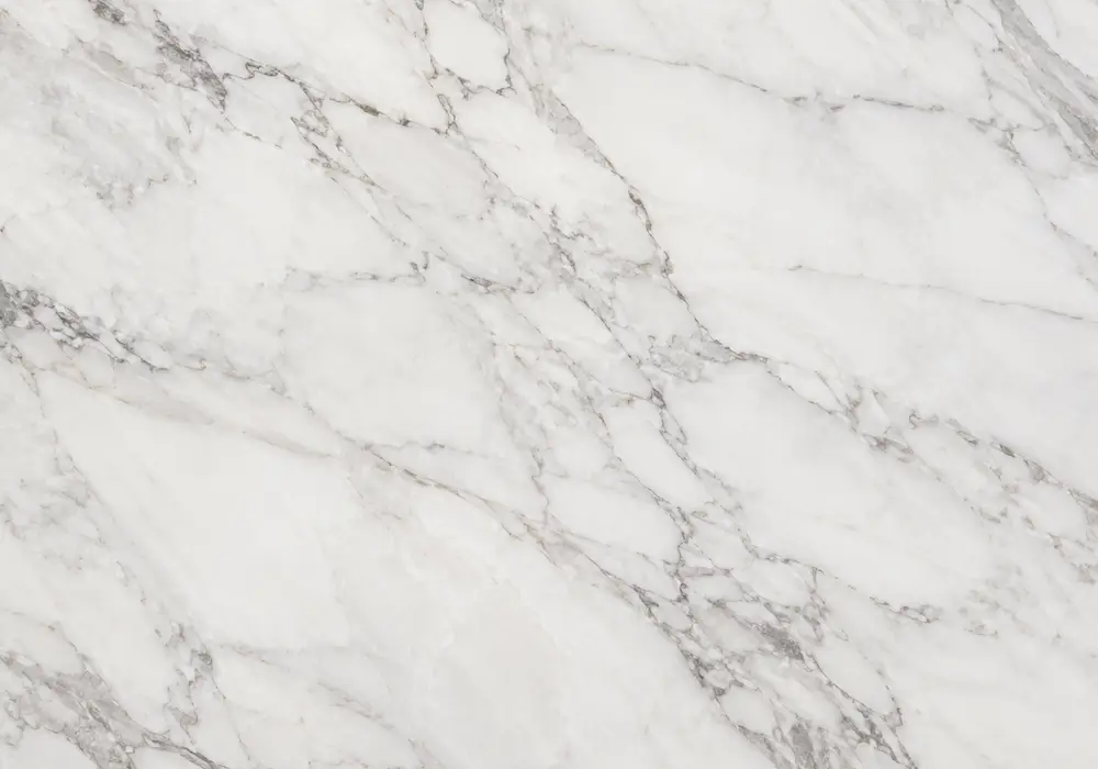 White Volakas marble statement console table with pearly white stone and elegant grey, hazelnut and soft gold veins.