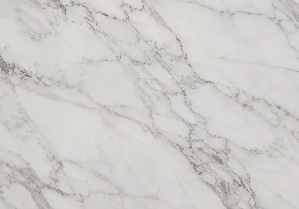 Katni Wonder marble displayed in beige and cream tones with clouded movement and natural veining, with smooth luminous depth.