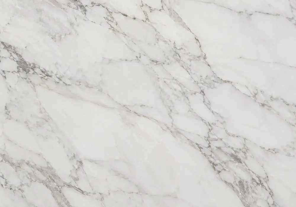 White Wood marble used in a hotel corridor, showing natural veining, polished stone depth and refined architectural detail.