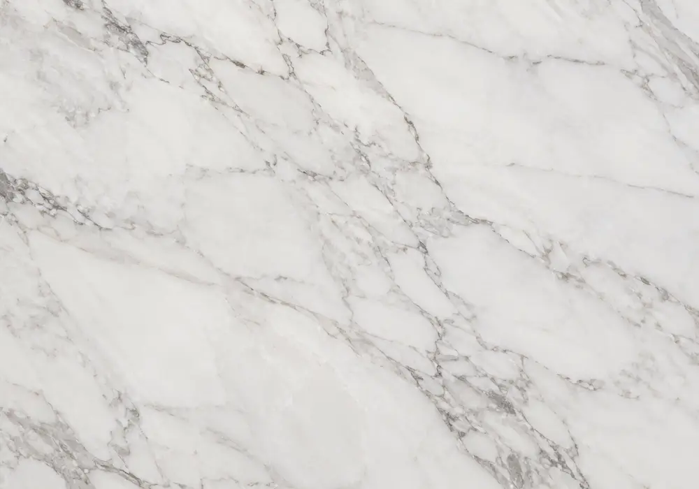ochre natural marble in a classical hotel foyer, showing natural veining, polished stone depth and refined interior detail.