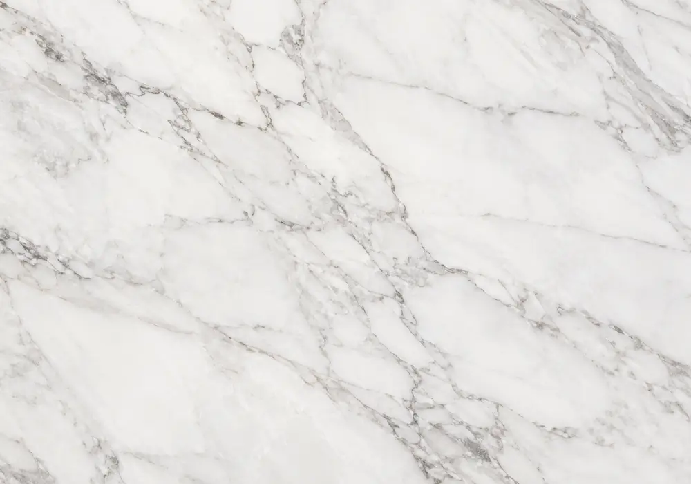 Honey, ochre and cream tones blend with rust veins in Yellow Marble, presenting the expressive yellow marble category stone.