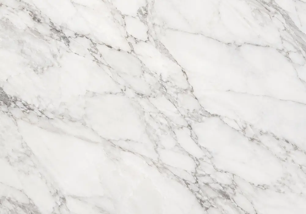 Broccatello marble in a classical Italian foyer, showing natural veining, polished depth and refined architectural detail.