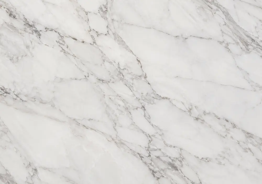 Yellow marble UAE on polished flooring, stairs and sculpted sink with honey-gold stone, cream veins and Mediterranean warmth.