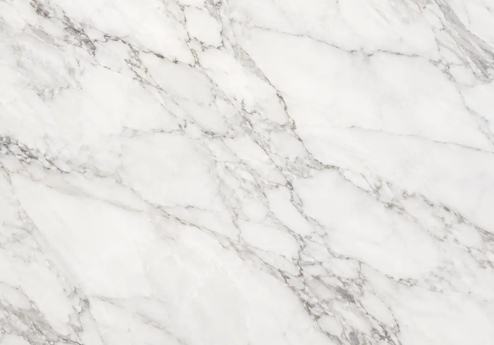 Ziarat flooring with polished worktops, honed stairs and bathroom areas in bright white stone with fine grey and beige veins.