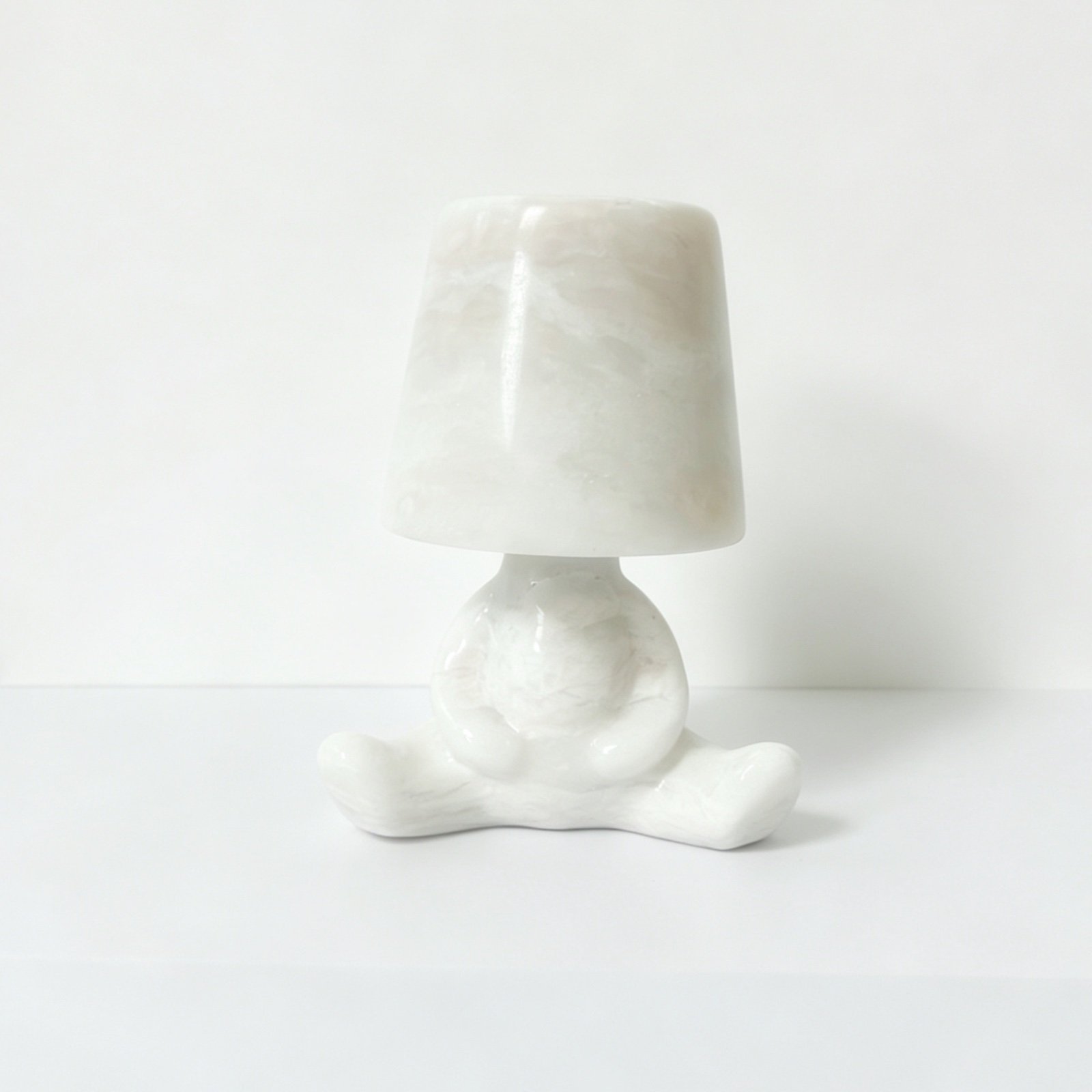 White Seated Figure Stone Table Lamp image 1
